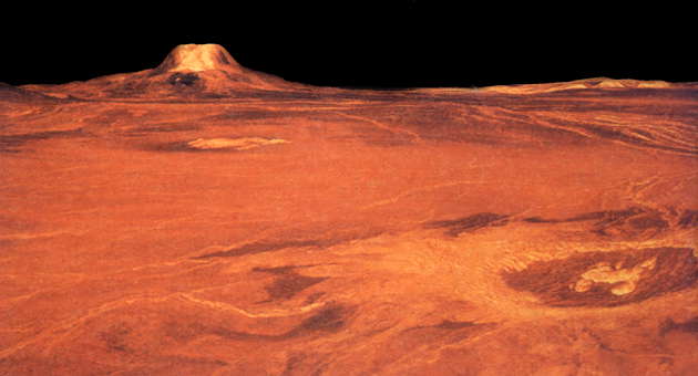 Венера. Радиолокационное изображение участка поверхности Венеры, переданное американским КА Магеллан. Слева видна гора Гула (ударный кратер поперечником неск. сотен км и высотой ок. 3 км), справа внизу - ударный кратер Куниц (поперечник ок. 50 км).